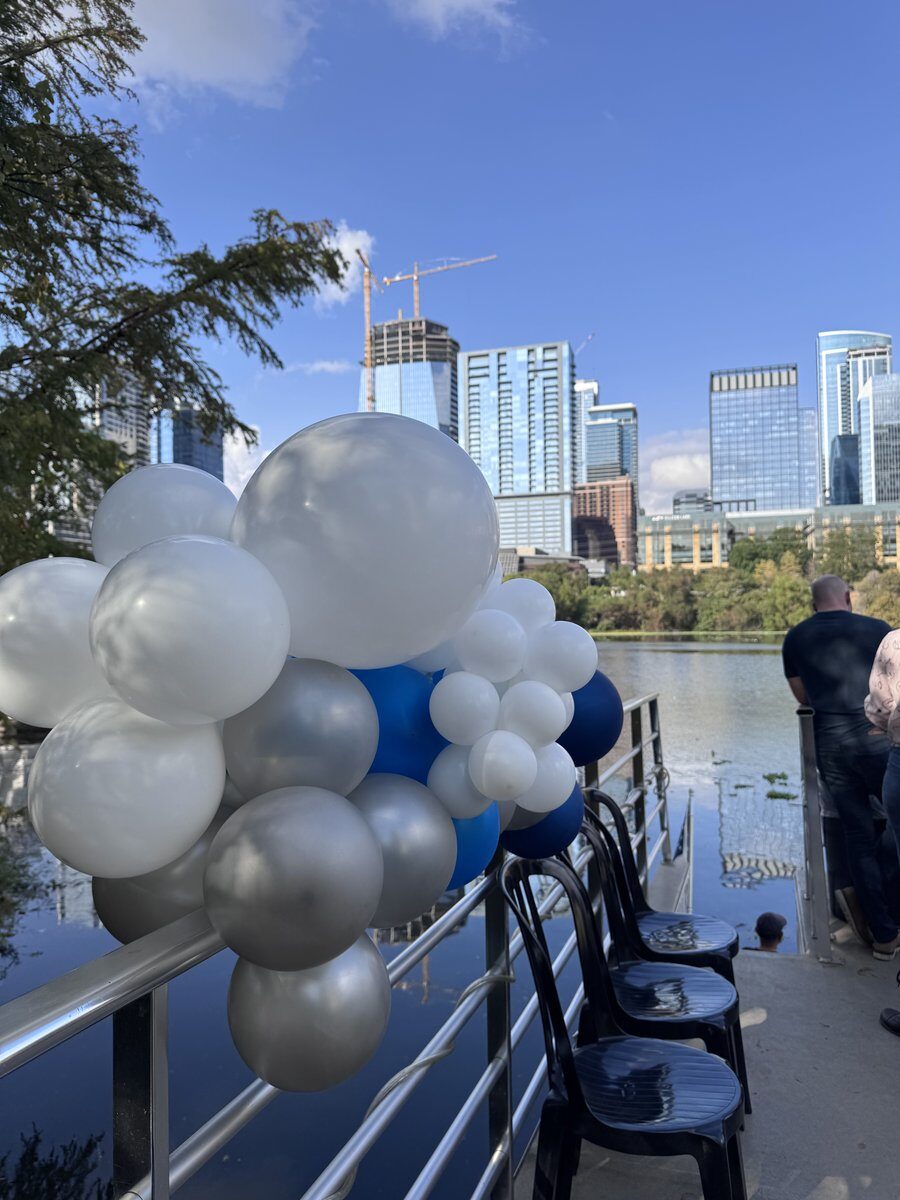 Balloon garland décor for Austin Boat Show event Austin TX