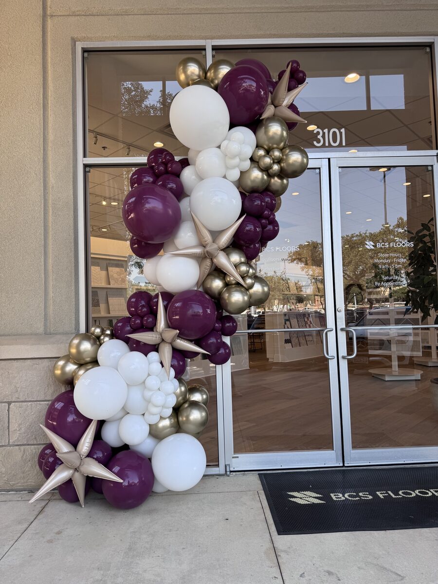 Custom balloon arch for BCS Floors event in San Antonio Texas