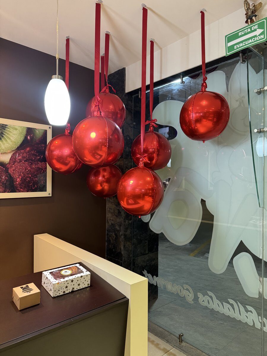 Custom Christmas balloon garland for seasonal store event San Antonio Texas