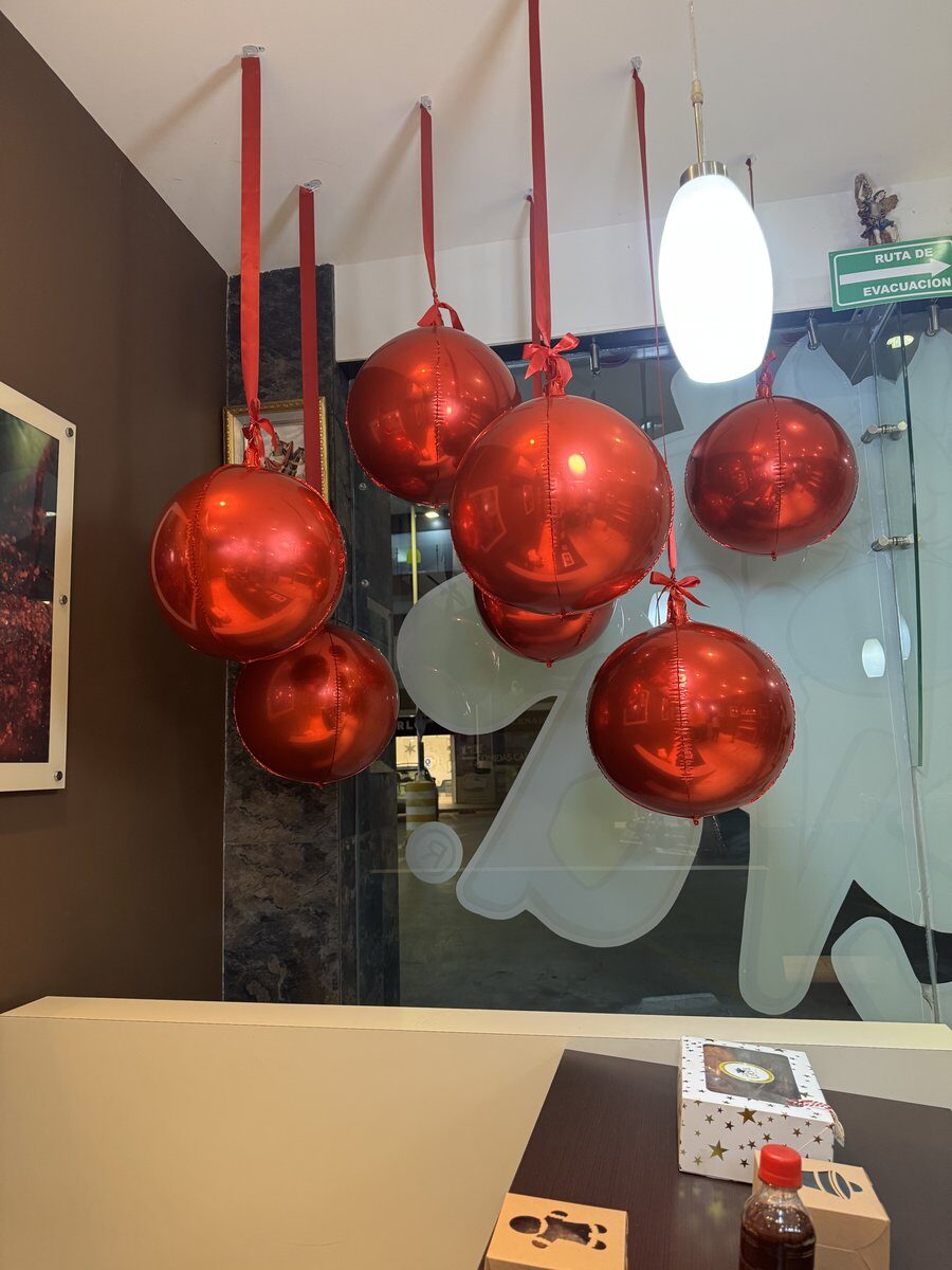Holiday balloon arch for Christmas Store décor in San Antonio TX
