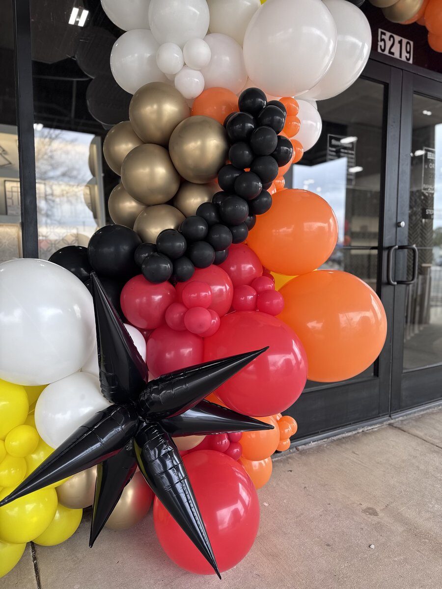 Custom balloon arch for The Tile Shop retail event in San Antonio Texas