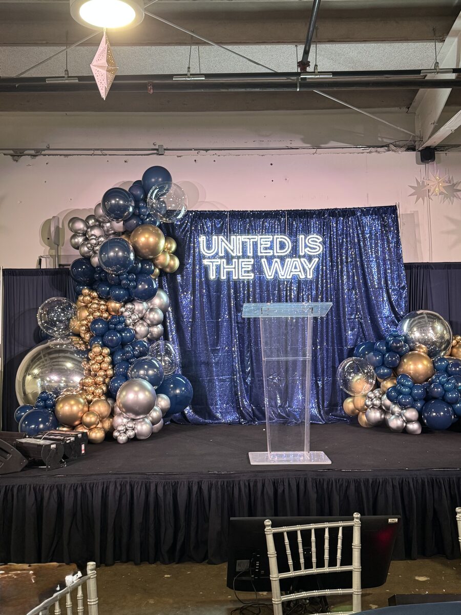 Custom balloon arch installation for United Way Gala San Antonio